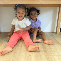 Hi girls! What are you doing under the table!?