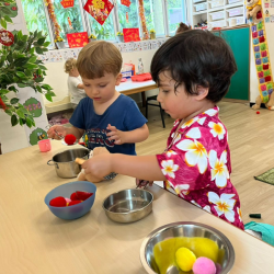 Leo and Milan busy cooking for CNY!