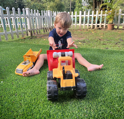 Leo enjoying pushing the diggers!