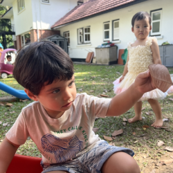 Milan holding an inch worm!