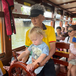 Kingston driving the boat
