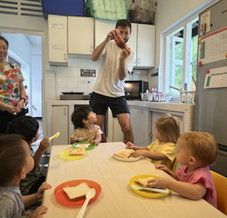 Watching Rosie’s daddy shake the sauce for our cheese on toast pizza!