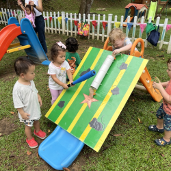 Alba trying to hit the rat!