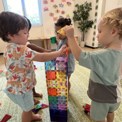 Alex and Kingston building with magnetic tiles!