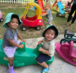 Amara and Otto on the seesaw.