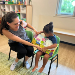 Amara and her mummy Mary reading a story to the class! Thank you!