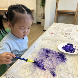 Annie working on her octopus craft!