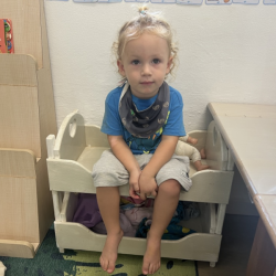 Kingston in the baby cot!