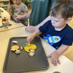 Luca printing shells into the Playdough!