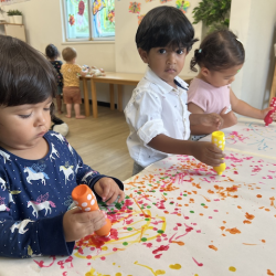 Lulu, Aarav and Alba enjoying the dot paint!