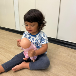 Lulu looking after the baby!