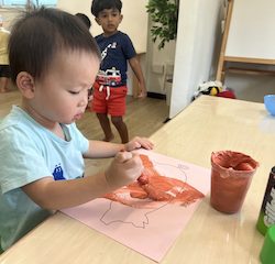 Nate painting his muddy pig!