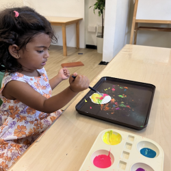 Sara painting her shell!