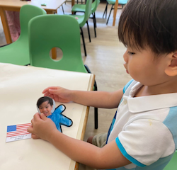 Avery working on his UN day craft.