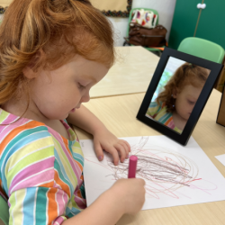 Jessie draws her beautiful self-portrait, and having fun in the garden!