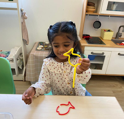 Kaavya working on her fine motor skills