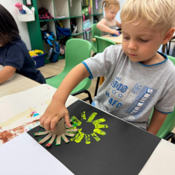 Rowan enjoying his art work