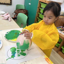 Toria enjoying bollan painting