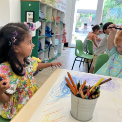 Savhara and Jessie having fun with mark making.