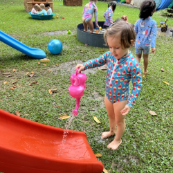Victoire enjoying splash time.