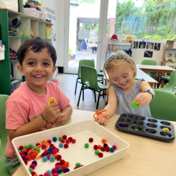 Kathavya & Poppy happily sorting.