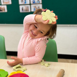 Victorie is very happy with her playdough flower!