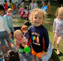 Enjoying the water play on a hot day
