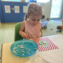 Annabel is working on her Christmas art.