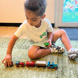 Archish is connecting the trains together.