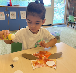Archish is working on his owl art.