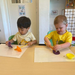 Niko and Thomas enjoying play dough