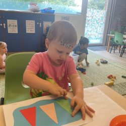 Thomas is working on his Christmas art.