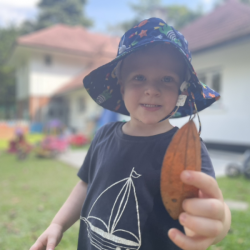 Thomas went on a leaf hunt in the garden.
