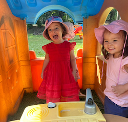 Zaya and Tahlia are playing in the house together.