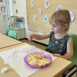 Annabel working on Easter art.