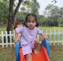 Eden enjoying outdoor play.
