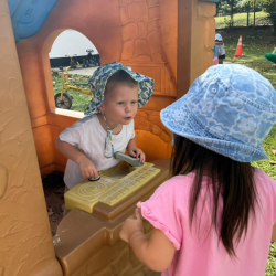 Ellie and Archer enjoying outside play.