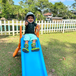 Kai enjoying outside play.
