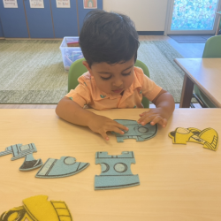 Kai working on transportation puzzles.