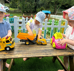 Playing with trucks together.