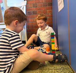 Zach and Sebby are building together.