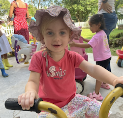 Annabel enjoying outside play.