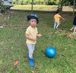 Daniel enjoying outdoor play.