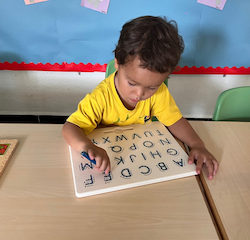 Rowan working on his ABCs.