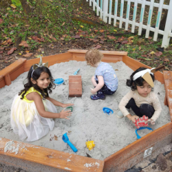 Enjoying the sandpit together.