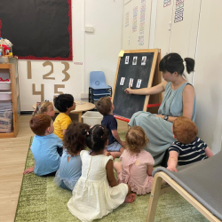 Ms Angelia introduced the names of Community Helpers in Chinese too.