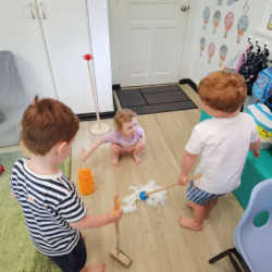 Our little Ladybirds are practising to help clean up at home.