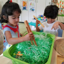 Enjoying  the Easter sensory tray!