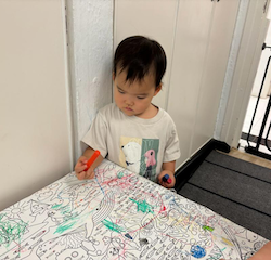 Cara doing some colouring in.