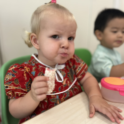 Eleanor loving the chewy rice puff!